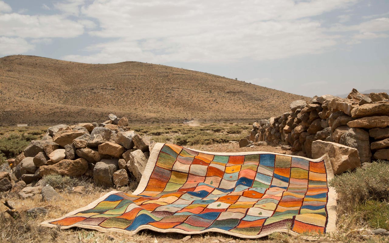Hand knotted nomadic rug in Iranian highlands
